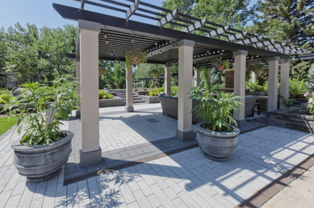 Cedar pergola entertaining patio with string lighting
